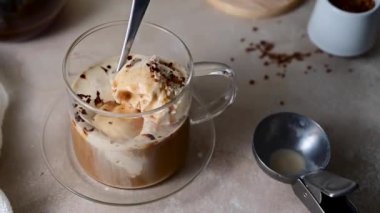 Affogato Italian dessert, coffee and ice cream in glass mug