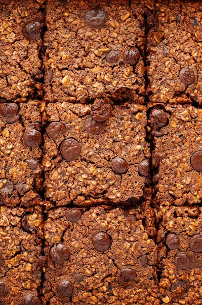 stock image Close-up oat brownies with chocolate chips and oats, macro texture. High quality photo