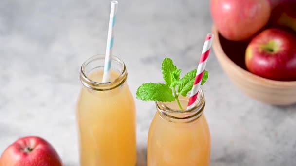 Apple Juice Glass Bottles Fresh Red Apples Paper Straws — Stock Video