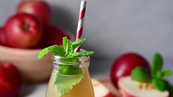 Apple Juice Glass Bottle Fresh Mint Red Apples — Stock Video