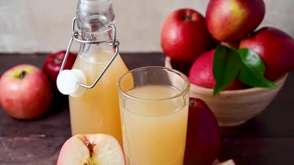 Apple Juice Glass Bottle Fresh Red Apples — Stock Video