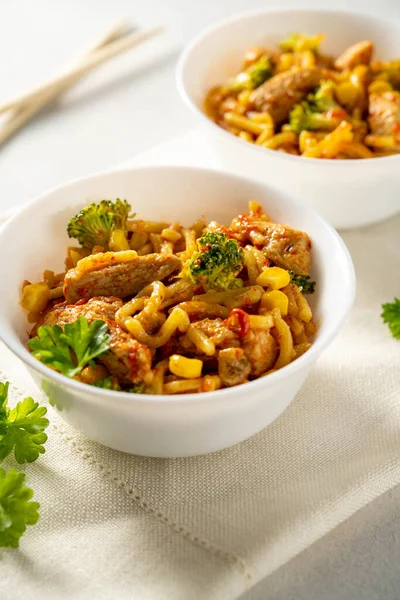 stock image Stir-fried egg noodles with chicken breast. Top view.