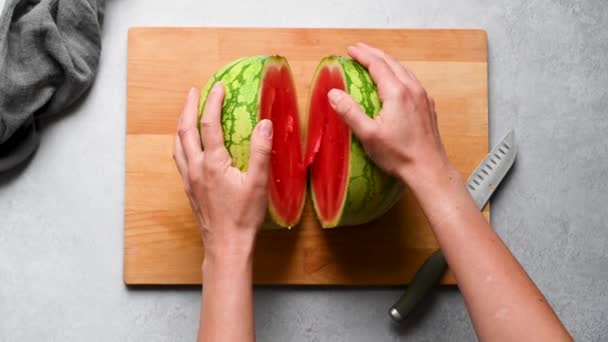 Fresh Watermelon Female Hands Cutting Red Juicy Watermelon Top View — Stock Video