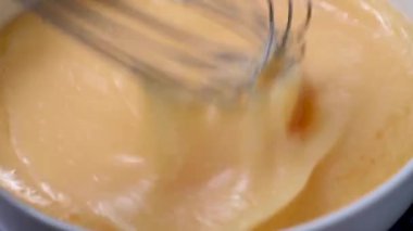 whisking eggs with a whisk. Cooking omelette or baking pastry. Protein food