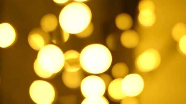 クリスマス抽象黄金の茶色の焦点のぼかしボケライト背景 4Kビデオ背景 — ストック動画