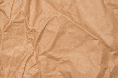 El işi ambalaj kağıdı. Düz buruşmuş selüloz ürünleri dokusu. Eski yırtık sayfa yüzey arkaplanı. Çevre dostu boş eski geri dönüşümlü ambalaj.