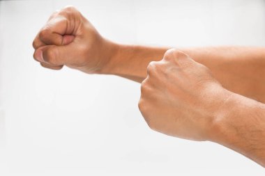 A man angry and aggressive man threatening with fist.