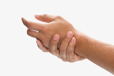 A man grab hand palm because the hand palm was injured. Hand pain. On a gray background.