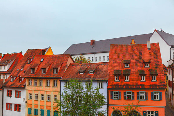 Houses of Old Town . Red tiled roofs of German architecture