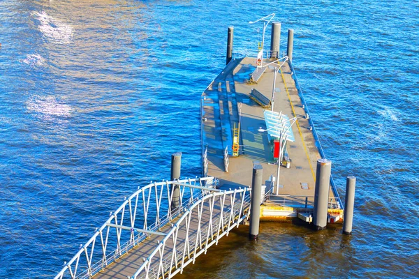 Water bus station on the river . Transporting passengers on the river Elbe in Hamburg