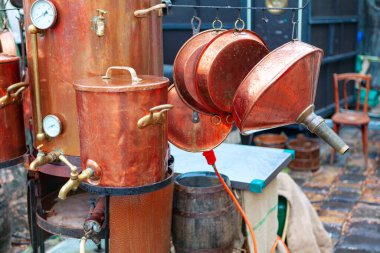 Copper utensils . Brass pots and pans . Street sale shop