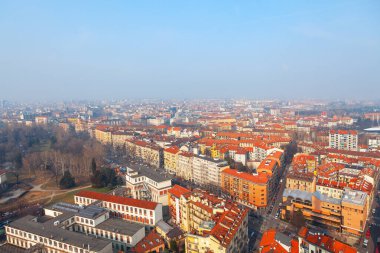 Aerial view of Turin City in Italy . Houses with red roofs in the city view from above