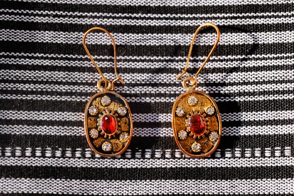 Ruby gold earrings . Traditional earrings in Albania style