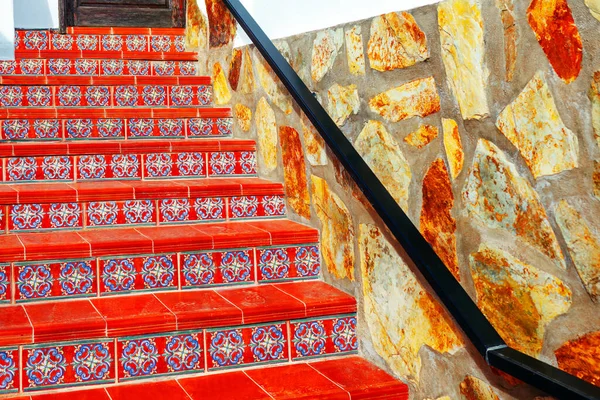 Terracotta stairs . Stair tiles . Rustic house entrance with authentic quarry tiles
