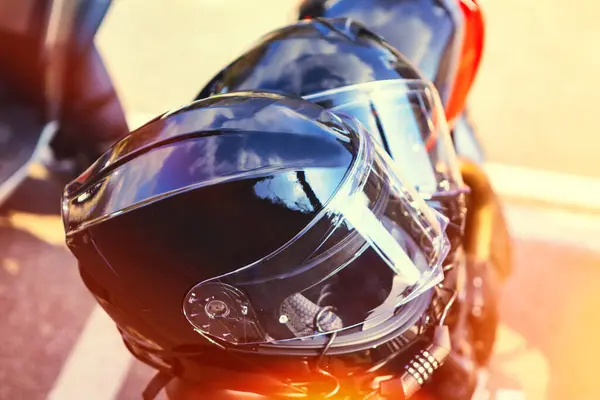 Motorcycle biker helmet closeup. Motorcycle helmet in soft focus