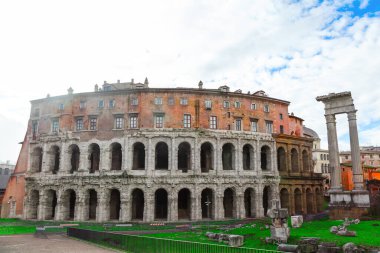 Teatro di Marcello in Rome Italy. Roman Empire architecture with arched windows and a large archway clipart