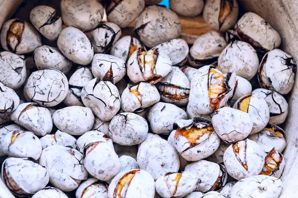 stock image Bunch of roasted chestnuts. Roasted chestnuts sold on the streets of Europe