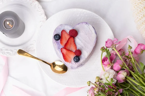 Trendy bento cake in love heart shape form on a light breakfast in bed background. Cake for Valentine\'s Day, Mother\'s Day, or Birthday, Love Forever Message, Romantic Bento Cake for Two
