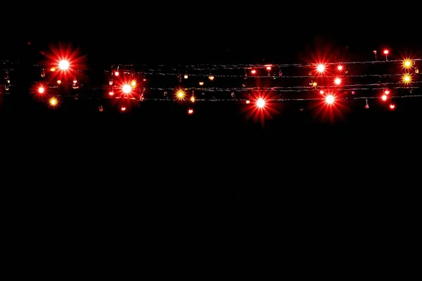 Festlicher Hintergrund Mit Roten Lichtergirlanden Auf Schwarzem Hintergrund Kopierhintergrund — Stockfoto