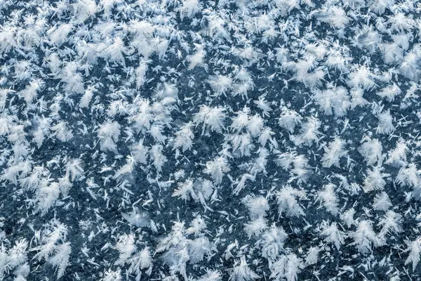 Big Fluffy Snowflakes Surface Ice Winter Christmas Background — Stockfoto