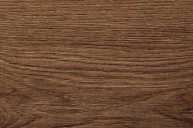 Koyu kahverengi ahşap arkaplan ve belirgin doku