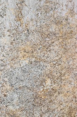 Gri bir beton duvarın yüzeyinden soyut bir arkaplan