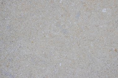 Açık gri granüler doku asfalt ya da beton yüzeyi taklit ederek grafik tasarımı ya da fotomontaj için ideal arkaplan olarak minimalist görünüm oluşturur