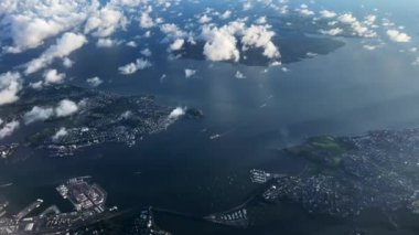 Aerial landscape view from a  plane flying above Auckland city CBD (Central Business District) in the north island of New Zealand.