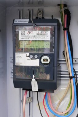 KERKERI, NZL - JAN 25 2023:Home smart meter, an electronic device that records information such as consumption of electric energy, voltage levels, current, and power factor.
