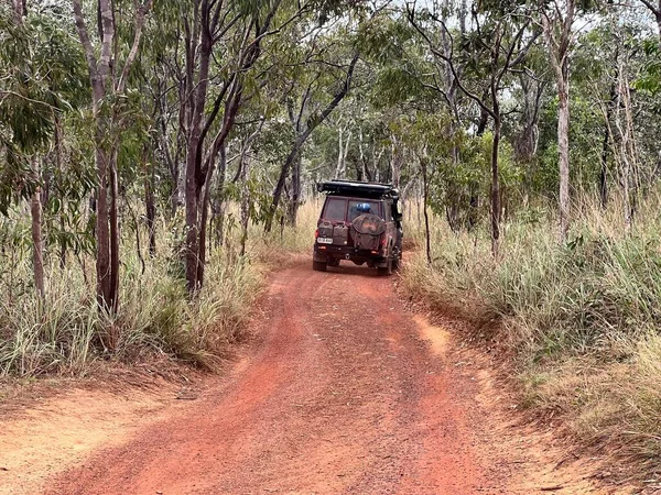 stock image CAPE YORK, QLD - JUNE 13 2023:Australian off road vehicle driving on the Old Telegraph Track an iconic 4WD track in Cape York Peninsula in tropical far north of Queensland, Australia.