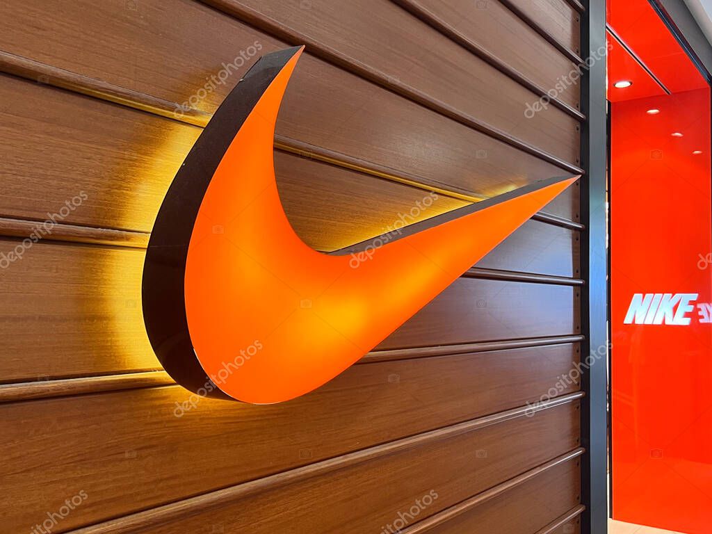 BRISBANE - MAR 24 2024: Nike sign shop exterior wall.In 2020, the brand alone was valued in excess of $32 billion, making it the most valuable brand among sports businesses