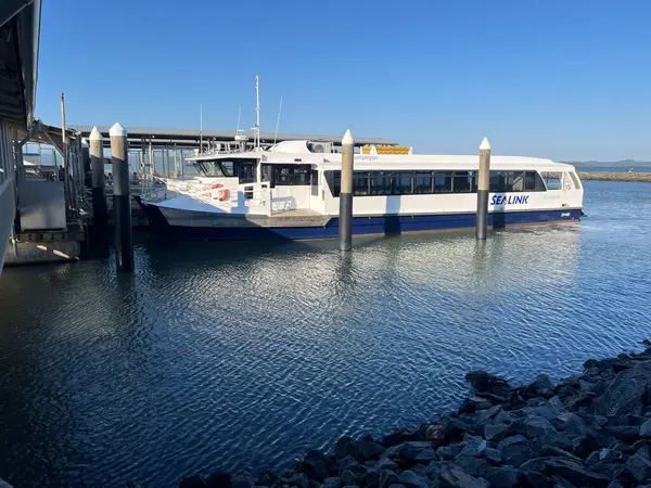 stock image MORETON BAY ISLANDS, QLD - AUG 25 2024: SeaLink ferry boat sea transport passengers between Bay Islands Queensland Australia. SeaLink is Australias largest marine and tourism business  listing on ASX