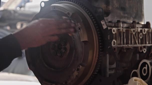 Mechanic Cleaning Worn Flywheel Gear Hand Sandpaper Footage — Stok Video