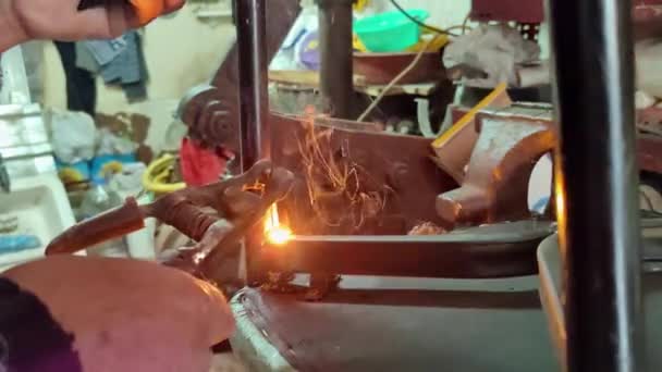 Old Man Repairing Broken Metal Chair Leg Electric Welding Footage — Stock video