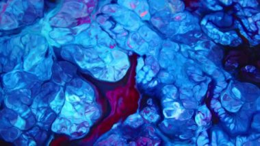 Sıvı Renkli Boya ağır çekimde patent alır. Sıvı renkli boya desenleri üst görünüm. Çok renkli sıvı boya yüzeyi.