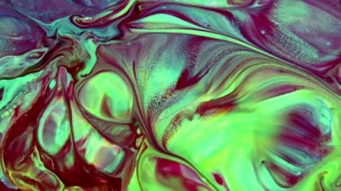 Bu stok videosu, sütün karışık renkli bir boyayla tanıştırıldığında ne olduğunu gösteriyor. Renkler kıvrılır ve yeni boya gölgeleri oluşturur yavaş yavaş bilye karışımına akar. Metin ve grafik ekleyerek bu soyut arkaplanı kullan,