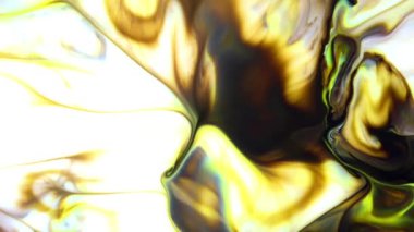 Bu stok videosu, sütün karışık renkli bir boyayla tanıştırıldığında ne olduğunu gösteriyor. Renkler kıvrılır ve yeni boya gölgeleri oluşturur yavaş yavaş bilye karışımına akar. Metin ve grafik ekleyerek bu soyut arkaplanı kullan,