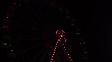 Ferris Wheel at Night in Amusement Park Footage.