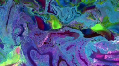 Karıştırıcıda kaynamış çok renkli boya karışımının yakın plan görüntüsü. Birçok video projesinde kullanılabilecek benzersiz bir soyutlama oluştururlar, arka plan olarak ya da bileşik element olarak..