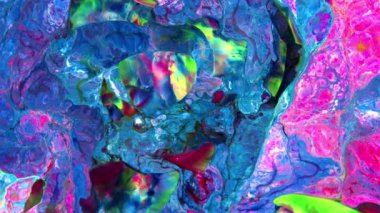 Karıştırıcıda kaynamış çok renkli boya karışımının yakın plan görüntüsü. Birçok video projesinde kullanılabilecek benzersiz bir soyutlama oluştururlar, arka plan olarak ya da bileşik element olarak..