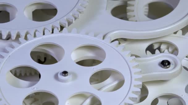 White Cogs and Gears Rotating Looping Footage.