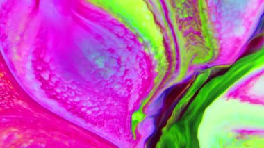 Sıvı boyaların akışkanlığıyla oluşan bu desenler renklerin karışması ve renklerin dansıyla oluşan büyüleyici harmoni ve dinamik hareketi gözler önüne seriyor. Yaratıcılığın keşfi ve renklerin sonsuz dönüşümü için görsel ziyafet. 