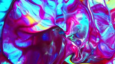 Sıvı boyaların akışkanlığıyla oluşan bu desenler renklerin karışması ve renklerin dansıyla oluşan büyüleyici harmoni ve dinamik hareketi gözler önüne seriyor. Yaratıcılığın keşfi ve renklerin sonsuz dönüşümü için görsel ziyafet. 