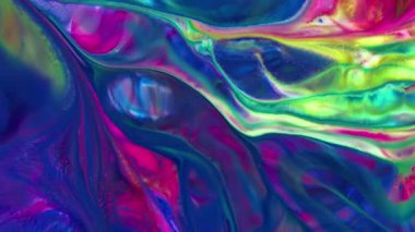 Sıvı boyaların akışkanlığıyla oluşan bu desenler renklerin karışması ve renklerin dansıyla oluşan büyüleyici harmoni ve dinamik hareketi gözler önüne seriyor. Yaratıcılığın keşfi ve renklerin sonsuz dönüşümü için görsel ziyafet. 