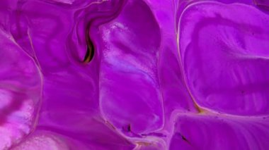 Bu video, yavaş çekimde yayılan koyu renkli boya karışımının aşırı yakın çekim görüntülerini içeriyor. Harmanlandıklarında, bu renkler hareketli grafiklerde bileşik element olarak kullanılabilecek güzel bir doku tasarımı oluştururlar..