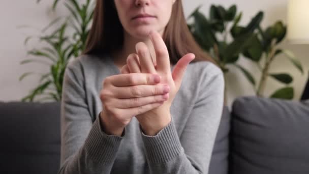 Close Unhealthy Young Woman Suffering Pain Hands Wrist Sitting Couch — Stock Video