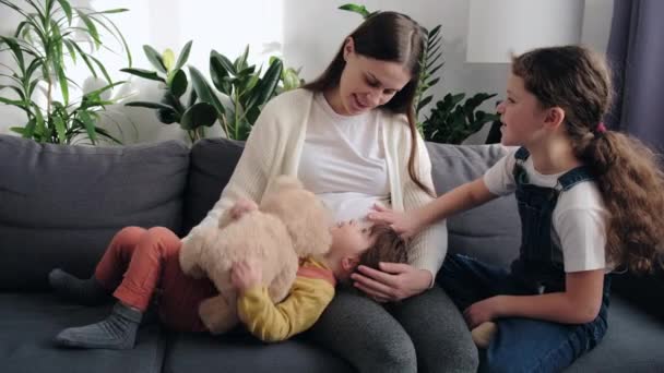 Affectionate Caring Young Pregnant Mother Talking Future Sibling Smiling Little — Vídeo de stock