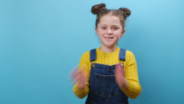 Portrait Happy Little Kid Girl Looking Aside Doing Winner Gesture — Stock Video