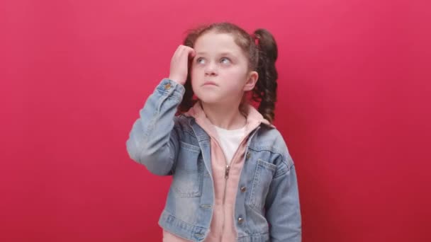 Pensive Little Kid Girl Gesturing Raised Palms Frowning Being Displeased — стоковое видео
