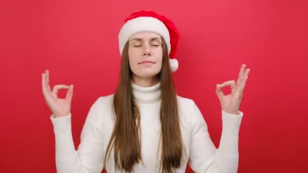 Merry Young Woman Wears Sweater Santa Hat Hold Hands Yoga — Stock Video